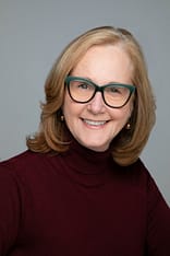 Suzanne F arms folded