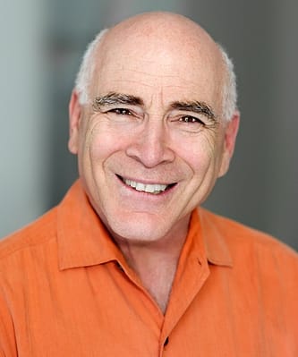 Alan Cahn Orange Shirt Headshot